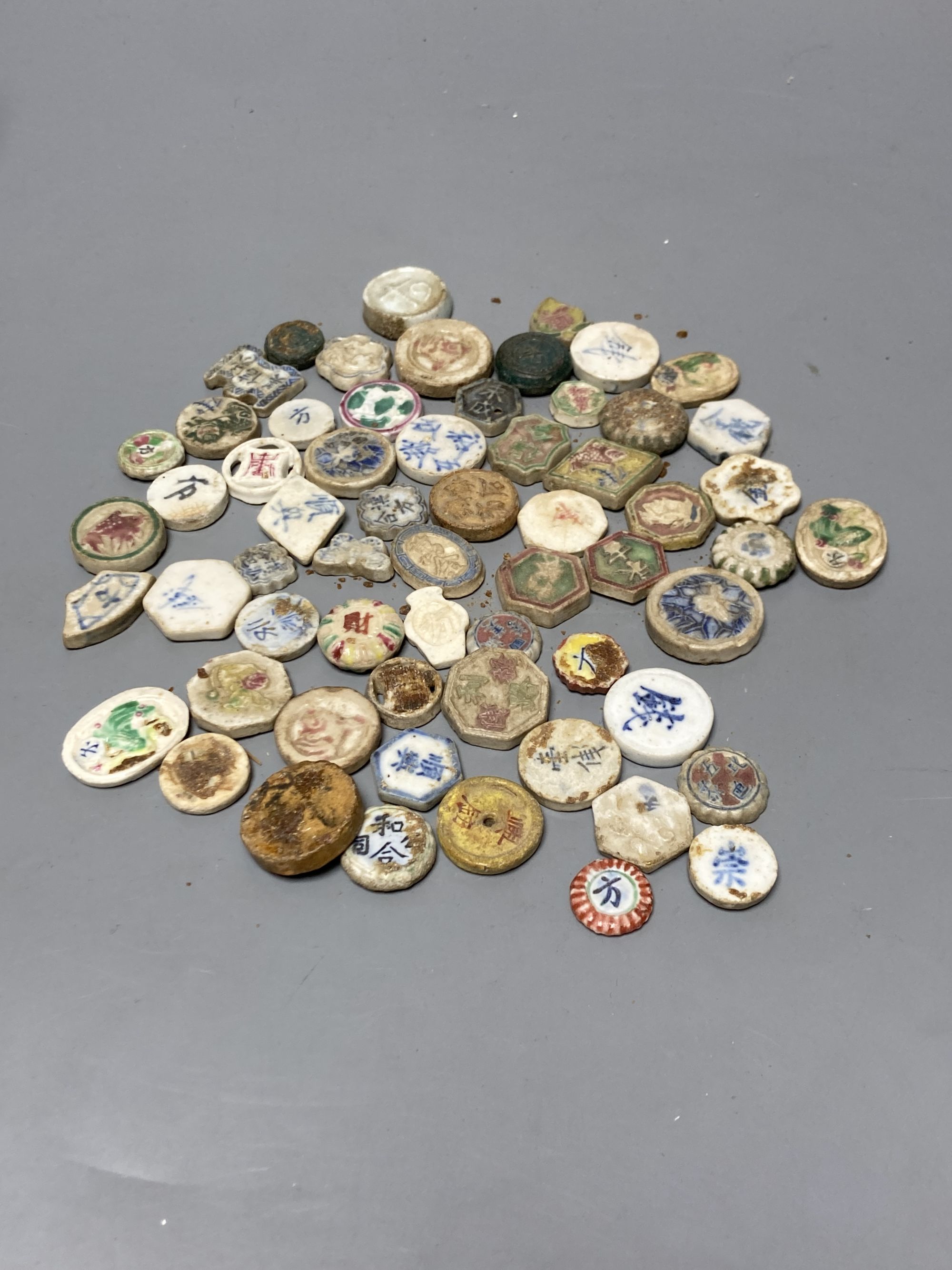 A group of Siamese porcelain gaming counters